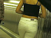 Nobody pays attention in the crowded subway. The easiest way to shoot spy jeans video with hot chick playing leading part